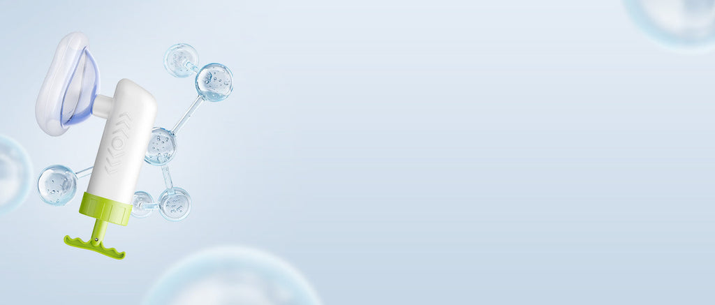Mumany manual device in a wide pale blue product scene